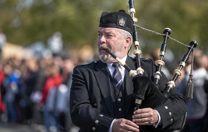 Bagpiper representing unwanted sounds